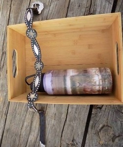 lot 111 image: western belt metal water bottle and wooden basket