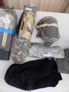 lot 83 image: Army Items hat knee pads tent and rubber apron