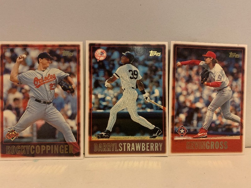 lot 128 image: 1997 TOPPS BASEBALL 3-CARD LOT  DARRYL STRAWBERRY YANKEES, ROCKY COPPINGER ORIOLES & KEVIN GROSS