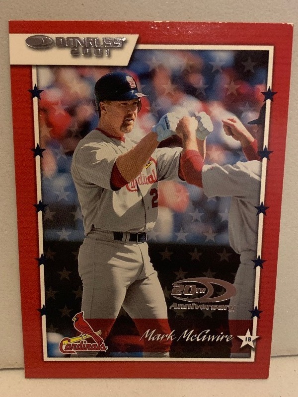 lot 143 image: 2001 DONRUSS MARK McGWIRE 20TH ANNIVERSARY  ST. LOUIS CARDINALS BASEBALL CARD