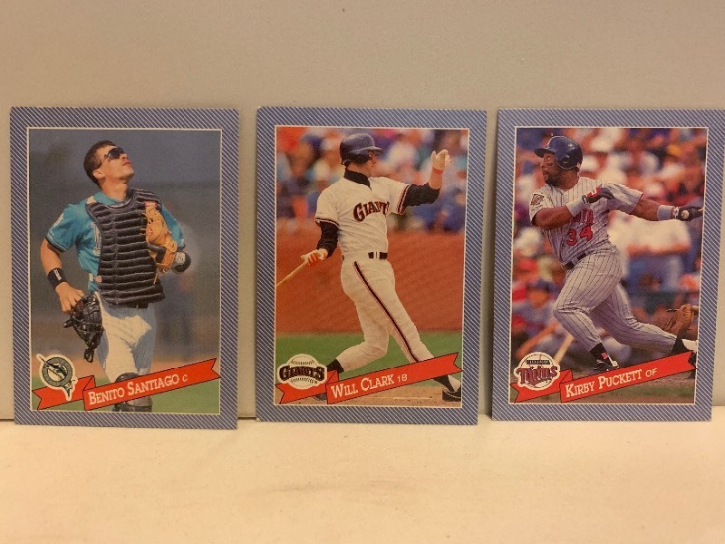 lot 147 image: VINTAGE BASEBALL CARD LOT  BENITO SANTIAGO, WILL CLARK & KIRBY PUCKETT  3 CARDS