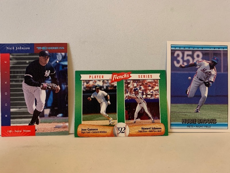lot 180 image: BASEBALL CARD LOT  1999 DONRUSS NICK JOHNSON ROOKIE, FRENCHS CANSECOHOWARD JOHNSON & 1992 DONRUSS HUBIE BROOKS  3 CARDS