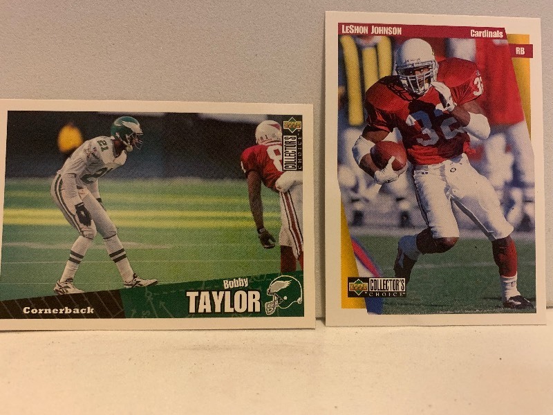 lot 220 image: LOT OF 2 UPPER DECK COLLECTORS CHOICE NFL CARDS  BOBBY TAYLOR & LESHON JOHNSON