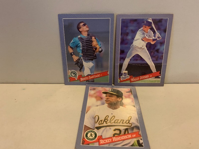 lot 279 image: 1993 HOSTESS BASEBALLS CARD LOT  RICKEY HENDERSON, BENITO SANTIAGO & WALLY JOYNER  3 CARDS
