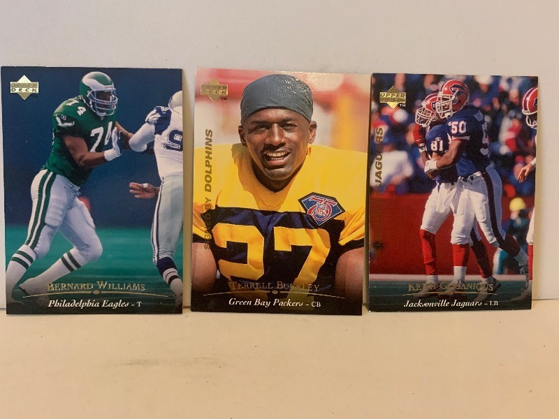 lot 140 image: UPPER DECK NFL FOOTBALL CARD LOT  BERNARD WILLIAMS, TERRELL BUCKLEY & KEITH GOGANIOUS  3 CARDS