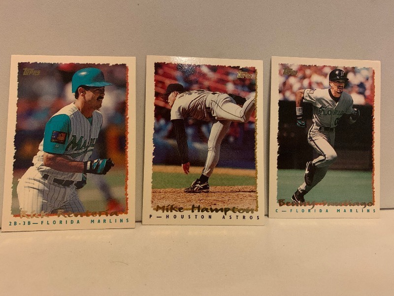 lot 150 image: 1995 TOPPS BASEBALL CARD LOT  KURT ABBOTT, MIKE HAMPTON & CHARLES JOHNSON  MARLINS  ASTROS  3 CARDS