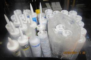 lot 99 image: CAULKING AND SILICONE TUBE