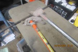lot 100 image: CONDUIT BENDER & GRASS EDGER