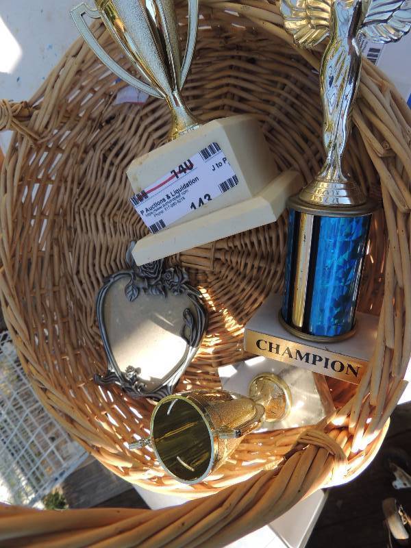 lot 143 image: basket of trophies