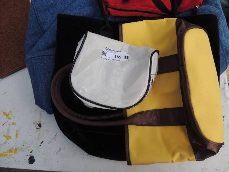 lot 155 image: several makeup and clutch bags