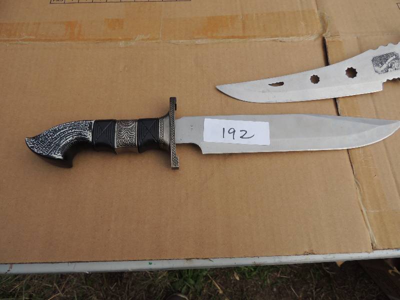 lot 192 image: Knives- x2  - stainless with 9 12 blade and defender with 9 blade