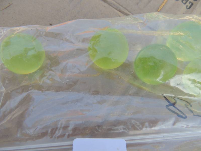 lot 262 image: VASELINE GLASS - 11 MARBLE SHOOTERS
