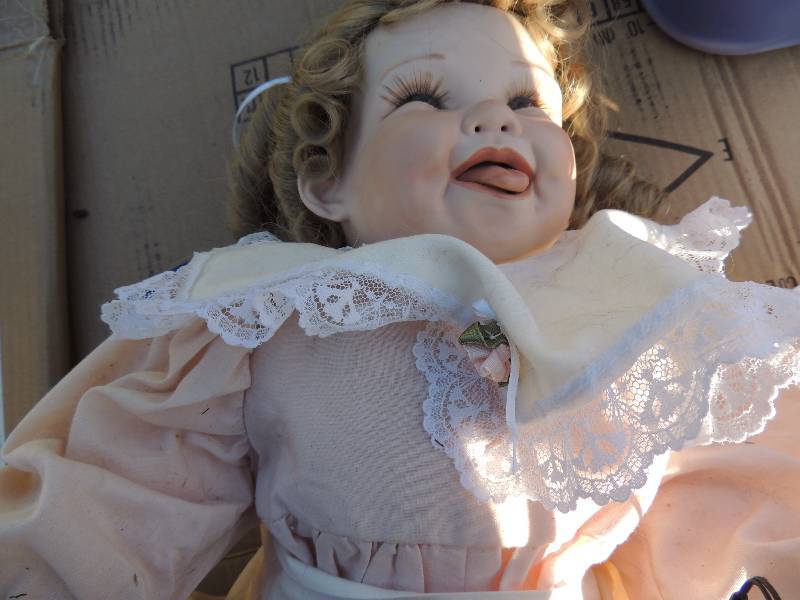 lot 310 image: Prayer doll, Alexandria porcelain body