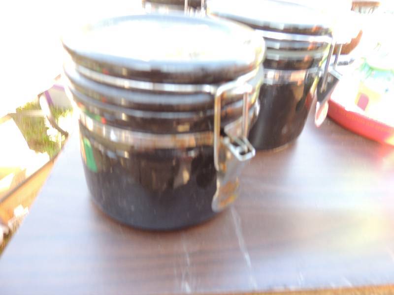lot 312 image: 5 Black canisters