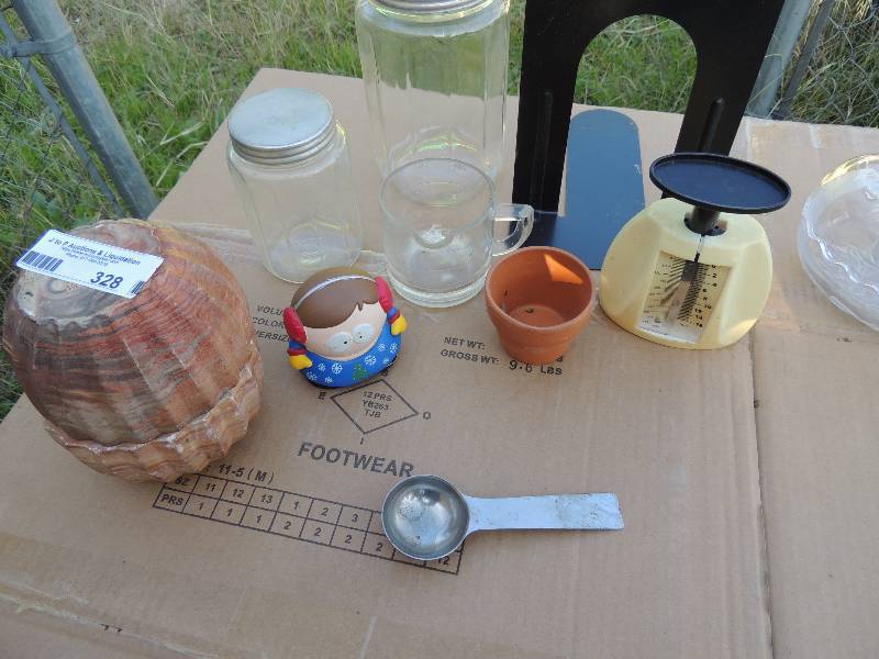 lot 328 image: Clay mold, scale, bookend, pot, measuring cup and more