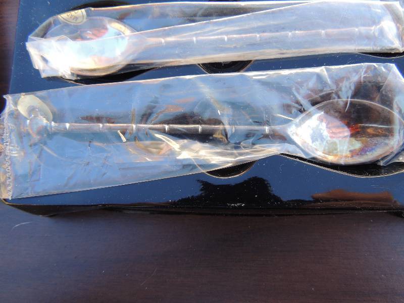 lot 365 image: Silver-plated spoons, Western star votive holders x 3
