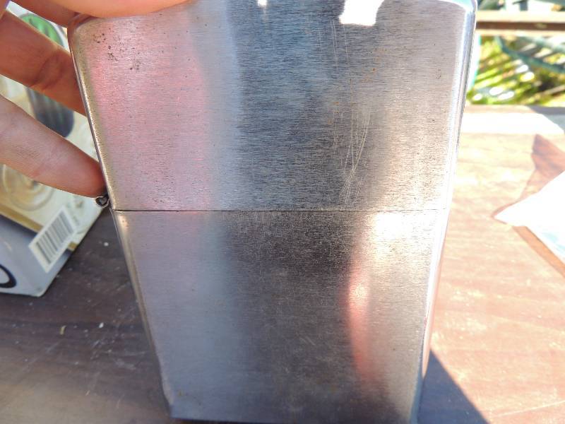 lot 416 image: Large Zippo lighter, Black ENAMEL Coffee  POT, , DAGGER