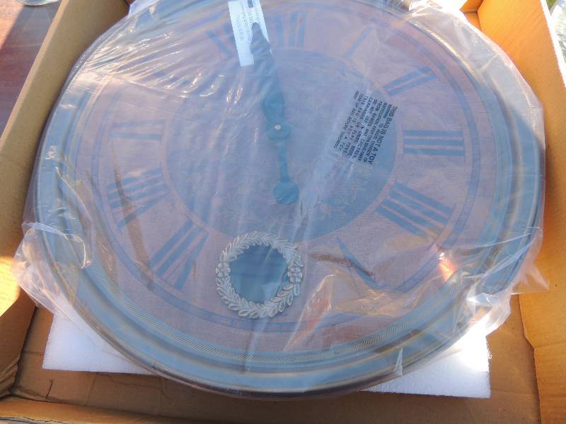 lot 462 image: Artistic time pieces wide eye designs WALL CLOCK - NEW IN BOX
