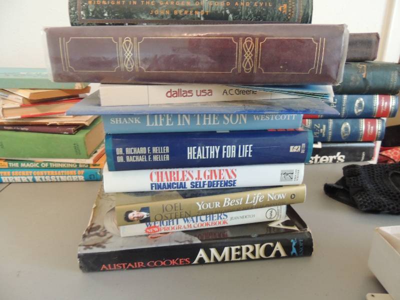 lot 616 image: Stack of books-Financial Health, etc.