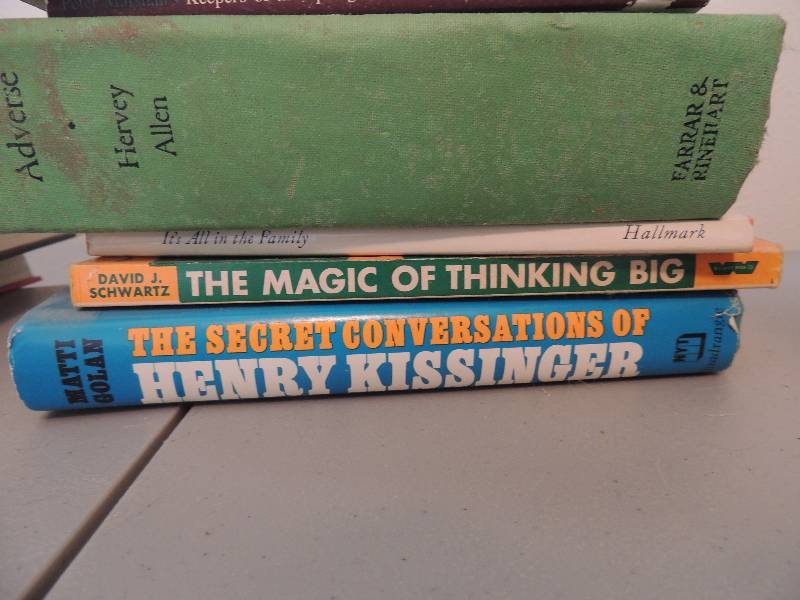 lot 617 image: Stack of books-Kissinger, Flowers never fade, etc.