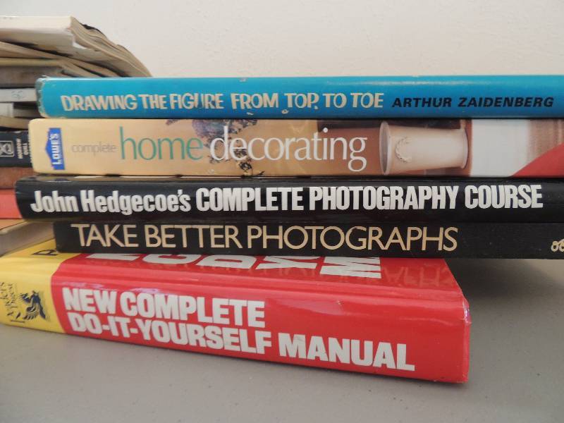 lot 618 image: Photography, home decor, repair books