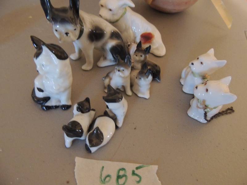 lot 685 image: Dog and cat figurines