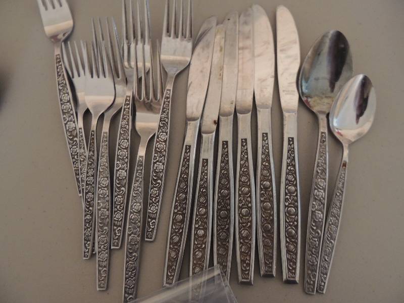 lot 698 image: Granada Rose  silverware stainless 15 misc. knives forks