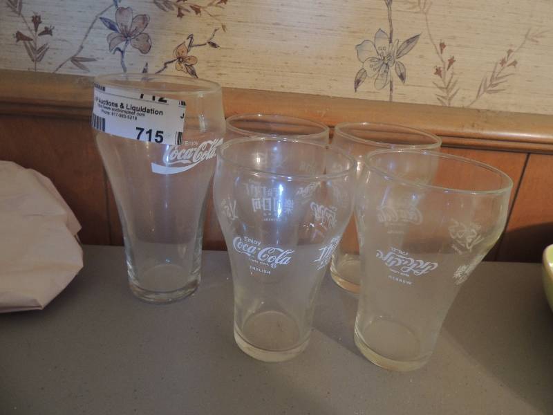 lot 715 image: 4 set of coca cola glasses and 1 Large one