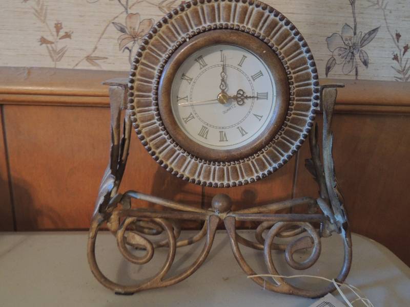 lot 722 image: Art still tagged at $30.00 Jane Seymour collection and clock