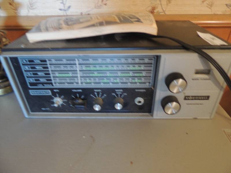 lot 753 image: Health kit band spread and Ford Mercury car book