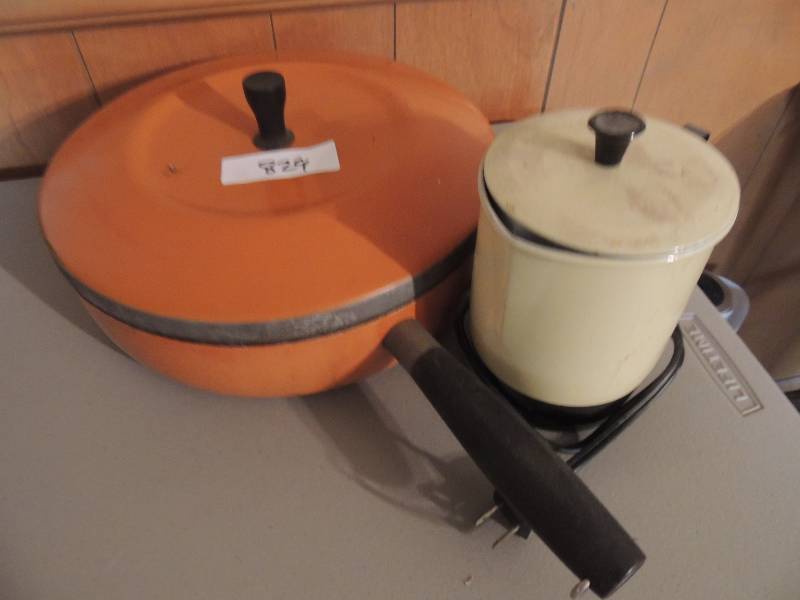 lot 829 image: Orange skillet and 4 cup coffee jug