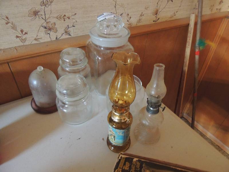 lot 832 image: Drummer Boy signature oil lamp, oil lamp, old candy jars(does not include old candy)  and 3 glass domes