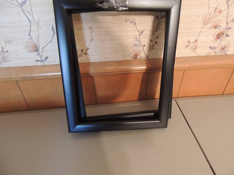 lot 942 image: 2 8x 10 black picture frames