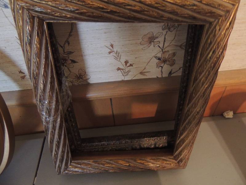 lot 588 image: 2 8 x 10 frames with outline decorations