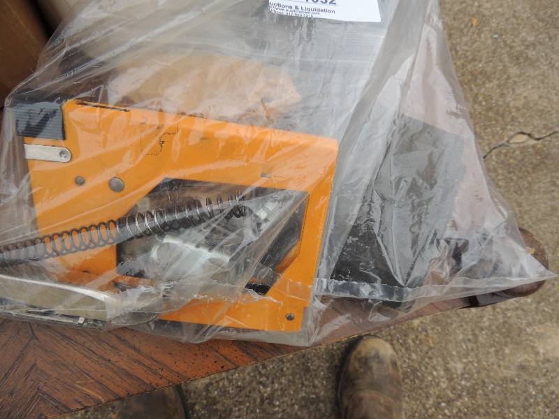 lot 1032 image: Staple gun, Fuji film clamp zip ties, sand paper