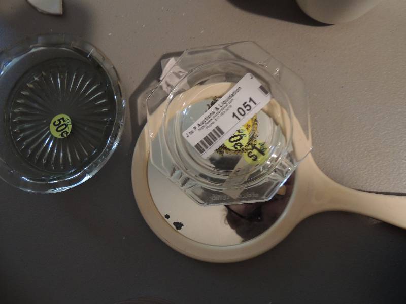 lot 1051 image: 2 ashtrays and handheld mirror