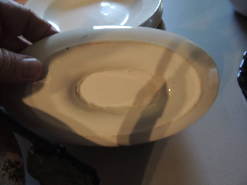 lot 1054 image: gravy boat, 3 soup plates, oval platter all made in England