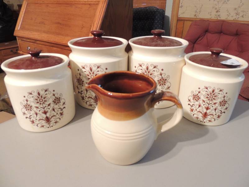 lot 846 image: 4 pottery canisters- sugar flour, corn meal, etc. Brown pitcher