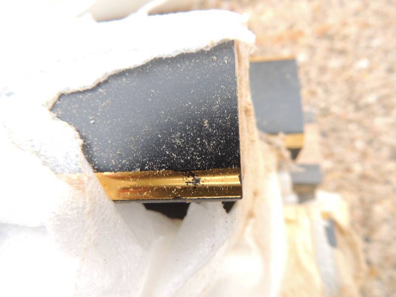 lot 932 image: Bundle of black and gold trim