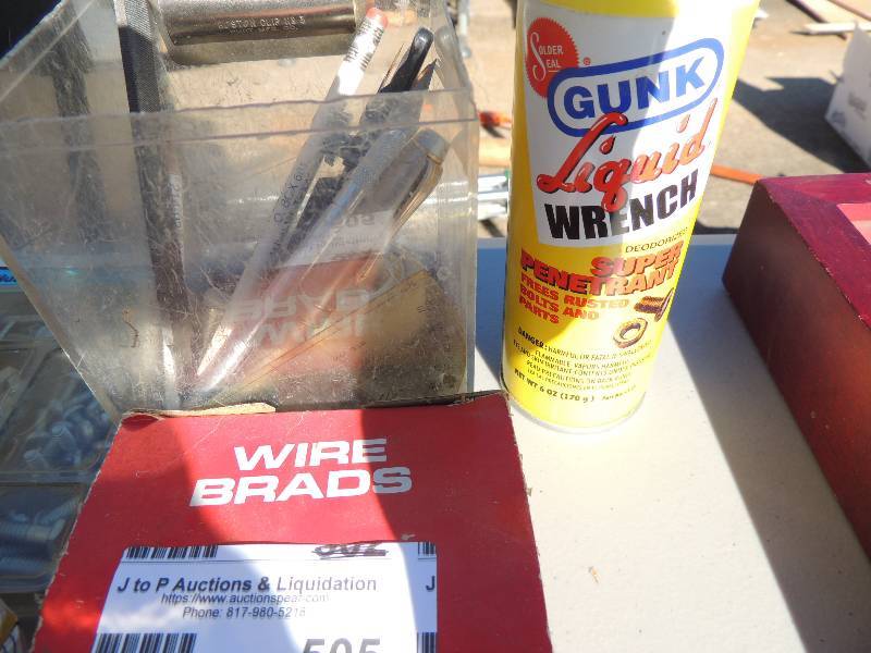 lot 505 image: Wine brad screws- 4 boxes  27 staples, liquid wrench, misc. nuts and bolts