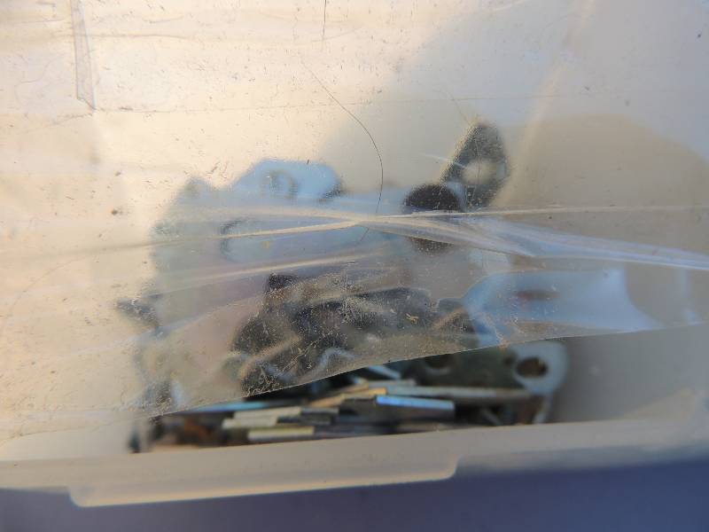 lot 511 image: Plastic tub of picture hangers