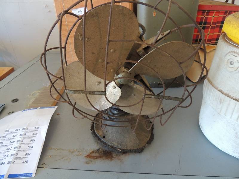 lot 553 image: Antique fan and igloo cooler