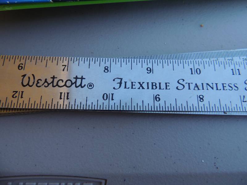 lot 985 image: 6 metal and 1 wood rulers