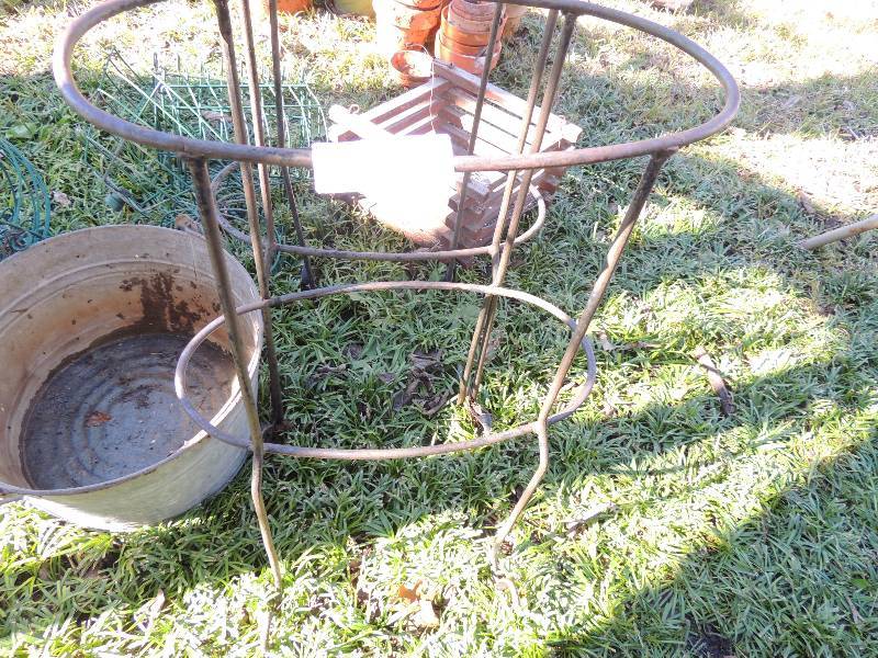 lot 386 image: 2 plant stands, 6 plant hangers and a metal bucket