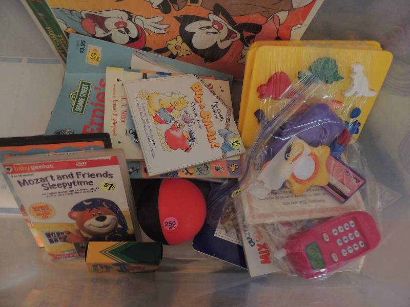 lot 1134 image: Childrens puzzles, books, coloring books, Dora DVD