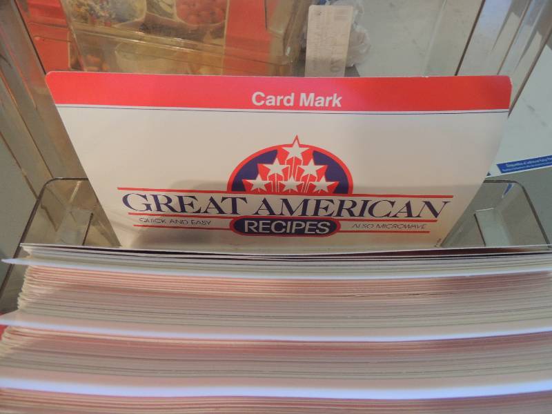 lot 1170 image: 2 boxes of recipes, napkin and towel holders, NEW pie crust molds, Star wars empire strikes back, raiders of the lost ark And art of star wars