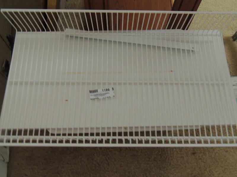 lot 1186 image: white storage racks