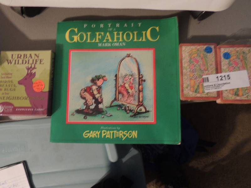 lot 1215 image: Golfaholic book, 2 decks of cards and wildlife cards