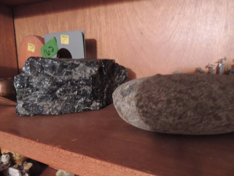 lot 161 image: Large lava rockobsidian and sedimentary rock possibly fossil