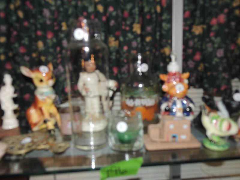 lot 196 image: Rose trivet box, Bambi bank, cow soap dispenser, etc.